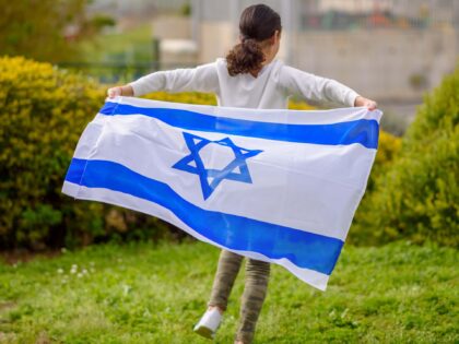 Girl with Israeli Flag (Getty)