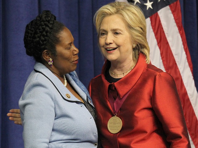 HOUSTON, TX - JUNE 4: Rep. Sheila Jackson Lee (D-TX) gives Democratic Presidential candidate Hillary Clinton a hug after her speech at the Inaugural Barbara Jordan Gold Medallion at Texas Southern University on June 4, 2015 in Houston, Texas. Clinton received the Barbara Jordan Public-Private Leadership Award at Texas Southern University and in her remarks, urged swift action to restore the Voting Rights Act and replace the provisions struck down by the Supreme Court. She also spoke about the destructive impact of restrictive laws in states like Texas, Wisconsin, North Carolina, and Ohio that make it harder for voters to access the voting booth and cast their ballots (Photo by Thomas Shea/Getty Images).