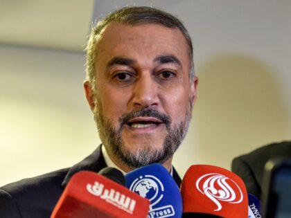 Iran's Foreign Minister Hossein Amir Abdollahian speaks to journalists as he arrives in Jeddah to attend an extraordinary meeting of the Organisation of Islamic Cooperation's (OIC) executive committee on October 18, 2023 regarding the situation in the besieged Gaza Strip. (Amer HILABI/AFP via Getty)