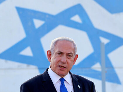 TOPSHOT - Israel's Prime Minister Benjamin Netanyahu delivers a speech during his vis