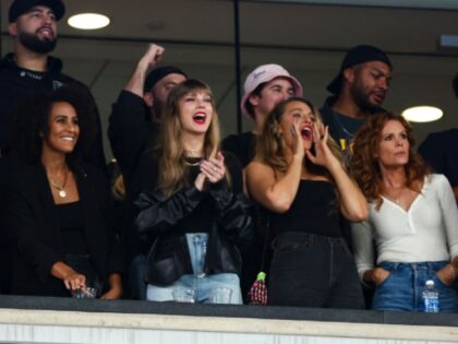 EAST RUTHERFORD, NJ - OCTOBER 1: Taylor Swift and Blake Lively cheer from the stands during an NFL football game between the New York Jets and the Kansas City Chiefs at MetLife Stadium on October 1, 2023 in East Rutherford, New Jersey. (Photo by Kevin Sabitus/Getty Images)