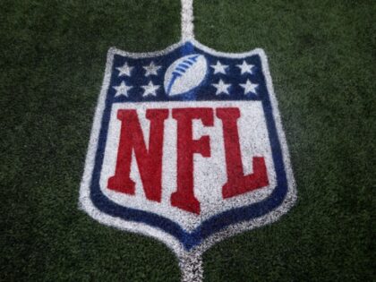 EAST RUTHERFORD, NJ - OCTOBER 1: An NFL shield logo is painted on the field prior to an NF