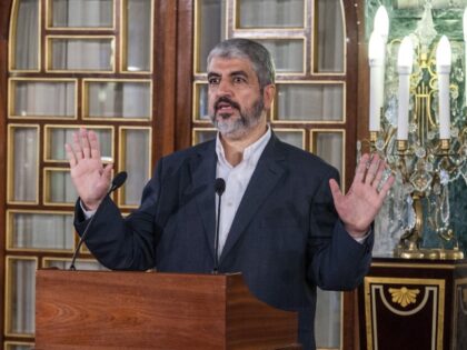 Hamas leader Khaled Meshaal speaks during a press conference after meeting with Tunisian P