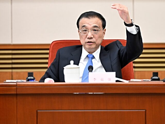 Chinese Premier Li Keqiang chairs a symposium to solicit opinions on a draft government wo