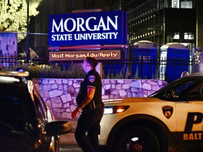 Police block off the south entrance to Morgan State University at Argonne and Hillen after