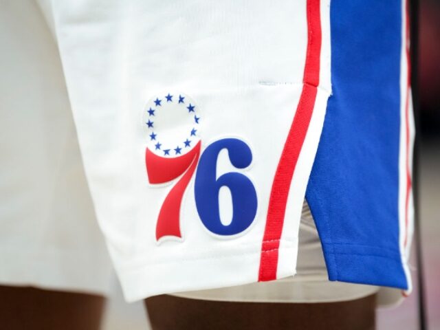 DETROIT, MICHIGAN - JANUARY 08: The Philadelphia 76ers logo is pictured on a uniform again