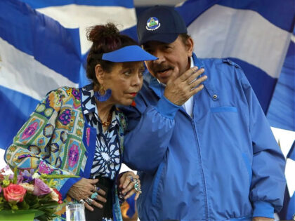FILE - Nicaragua's President Daniel Ortega and his wife, Vice President Rosario Murillo, lead a rally in Managua, Nicaragua. Nicaragua’s government on Wednesday, Aug. 23, 2023, declared the Jesuit religious order illegal and ordered the confiscation of all its property. (AP Photo/Alfredo Zuniga, File)