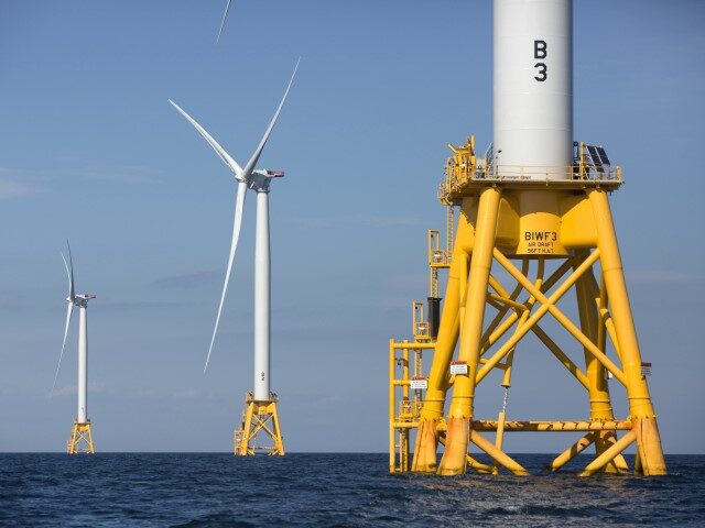 Three wind turbines stand in the water off Block Island, R.I, the nation's first offs