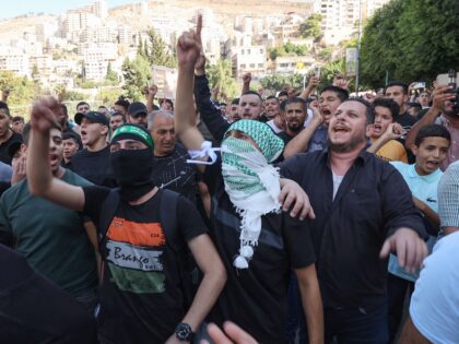 Palestnians celebrate (Jaafar Ashtiyeh / AFP via Getty)