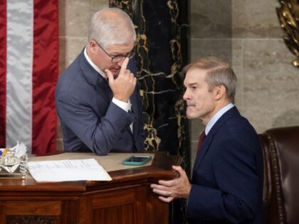 Temporary House leader Rep. Patrick McHenry, R-N.C., talks with Rep. Jim Jordan, R-Ohio, as Republicans try to elect Jordan in a second ballot to be the new House speaker, at the Capitol in Washington, Wednesday, Oct. 18, 2023. (Alex Brandon/AP)