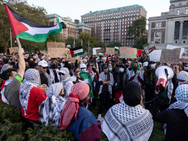 Pro-Palestinian demonstrators gather for a protest at Columbia University, Thursday, Oct. 12, 2023, in New York. Hamas militants launched an unprecedented surprise attack on Saturday killing hundreds of Israeli civilians, and kidnapping others. The Israeli military is pulverizing the Hamas-ruled Gaza Strip with airstrikes.(AP Photo/Yuki Iwamura)