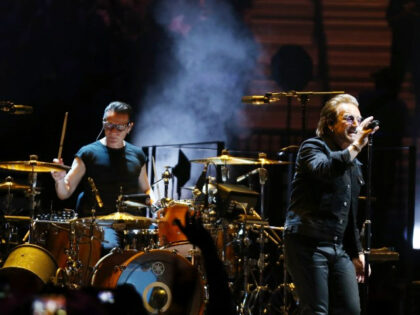 Drummer Larry Mullen Jr. (L) and singer Bono of U2 perform at T-Mobile Arena on May 11, 20
