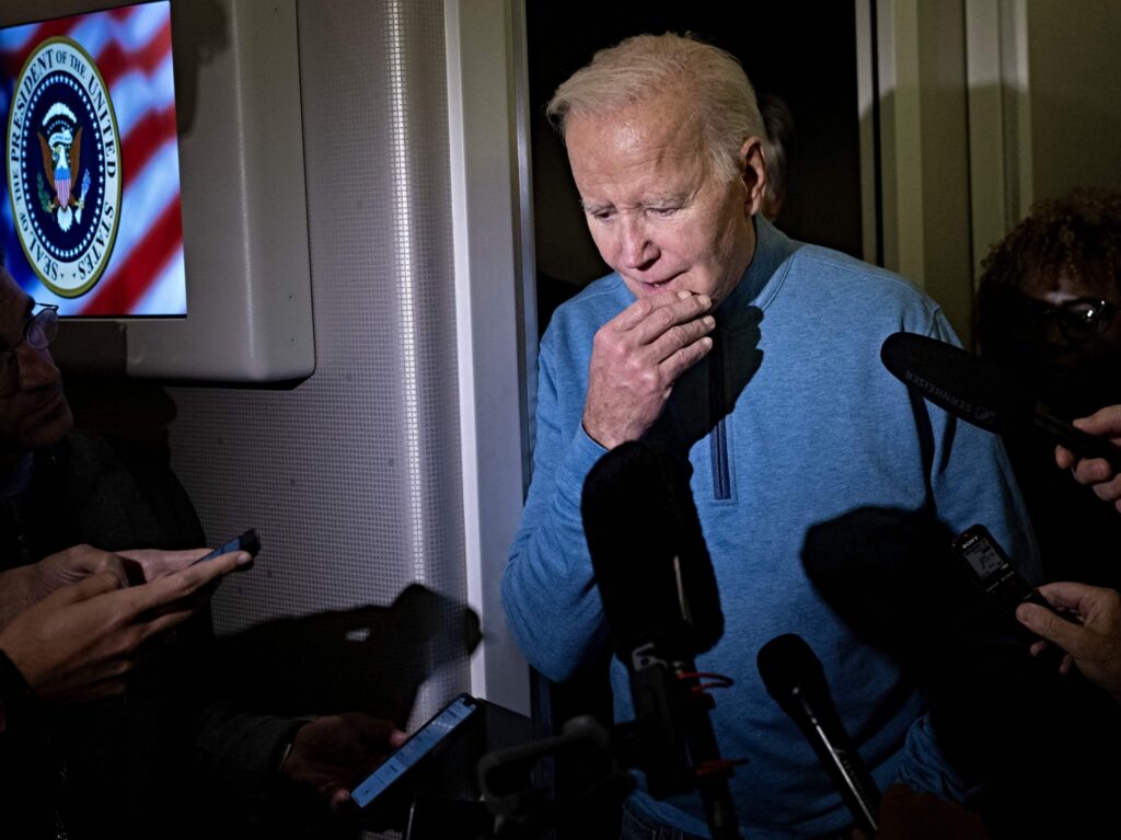 TOPSHOT - US President Joe Biden speaks to the press aboard Air Force One during a refueling stop at Ramstein Air Base on October 18, 2023 as he returns from a visit to Israel. (Photo by Brendan Smialowski / AFP) (Photo by BRENDAN SMIALOWSKI/AFP via Getty Images)