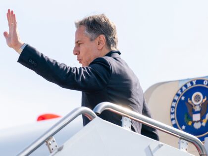 Secretary of State Antony Blinken boards his plane at Andrews Air Force Base, Maryland, on