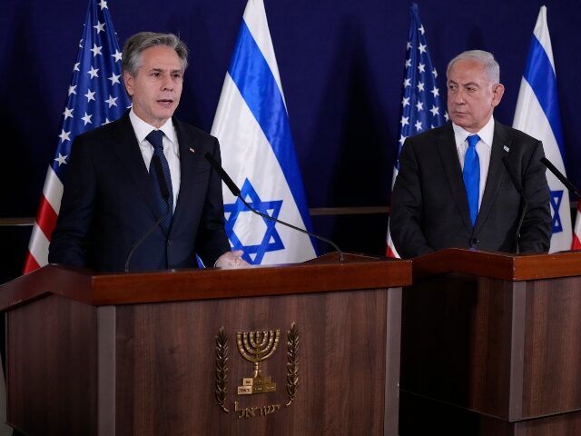 U.S. Secretary of State Antony Blinken, left, and Israel's Prime Minister Benjamin Netanyahu make statements to the media inside The Kirya, which houses the Israeli Ministry of Defense, after their meeting in Tel Aviv, Thursday Oct. 12, 2023. President Joe Biden is dispatching his top diplomat to Israel on an …