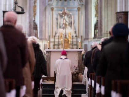 French bishop Francois Jacolin (C) leads a mass in the Cathedral of Lucon, western France,