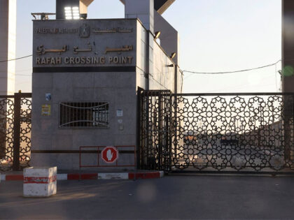 A picture taken on October 10, 2023, shows the closed gates of the Rafah border crossing w