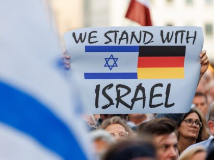 11 October 2023, Bavaria, Nuremberg: "We stand with Israel," reads the poster of