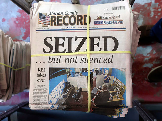 A stack of the Marion County Record sits in the back of the newspaper's building, awaiting unbundling, sorting and distribution, Aug. 16, 2023, in Marion, Kan. The police chief who led a highly criticized raid of the small Kansas newspaper is suspended, the mayor confirmed to The Associated Press on …