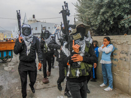 NABLUS, WEST BANK, PALESTINE - 2022/12/24: Masked Palestinian gunmen from the Al-Aqsa Mart