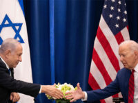 President Joe Biden shakes hands with Israeli Prime Minister Benjamin Netanyahu as they me