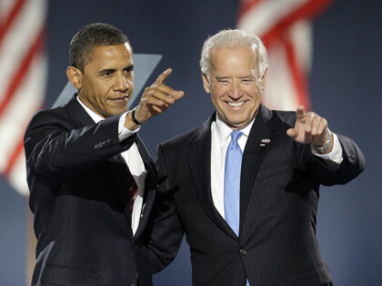 President-elect Barack Obama, left, and Vice President-elect Joe Biden wave to the crowd a