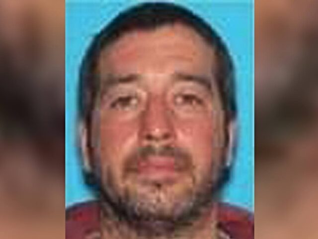 This photo released by the Lewiston Maine Police Department shows Robert Card, who police