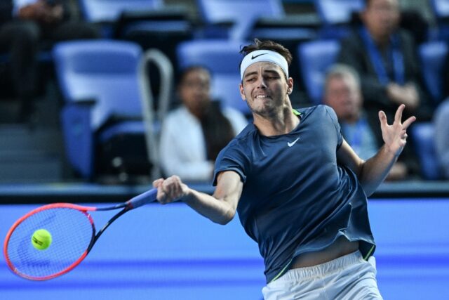 American Taylor Fritz plays a shot during his first-round match against Britain's Cameron