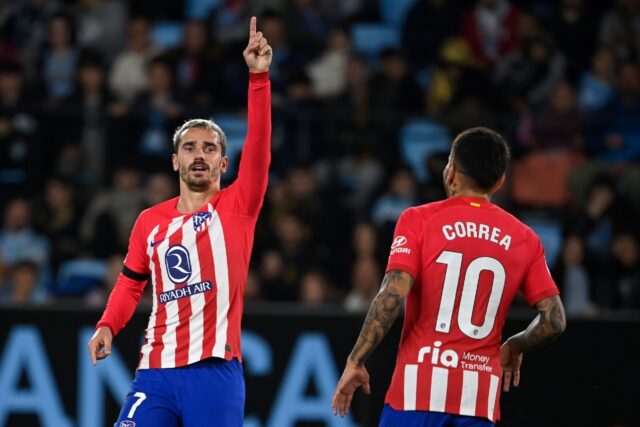 Atletico Madrid's French forward Antoine Griezmann celebrates in his team's emphatic trium