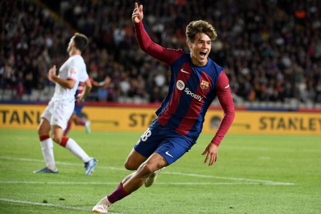 Barcelona forward Marc Guiu celebrates after scoring his first goal on his debut against A