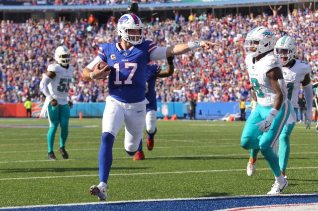 Buffalo quarterback Josh Allen runs the ball for a touchdown in the Bills' NFL victory ove