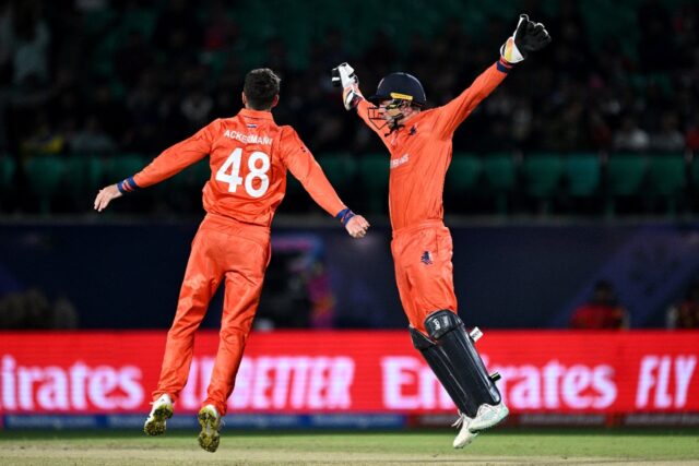 Let's celebrate: Netherlands captain Scott Edwards with Colin Ackermann after taking the c