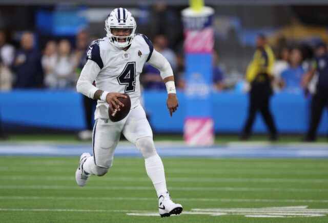 Dallas quarterback Dak Prescott threw one touchdown and rushed for another in the Cowboys