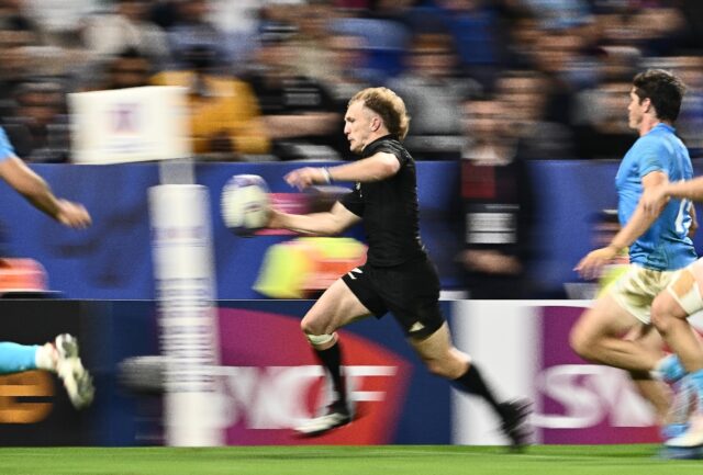 Dynamic full-back Damian McKenzie was the star as New Zealand ran in 11 tries to thump Uru