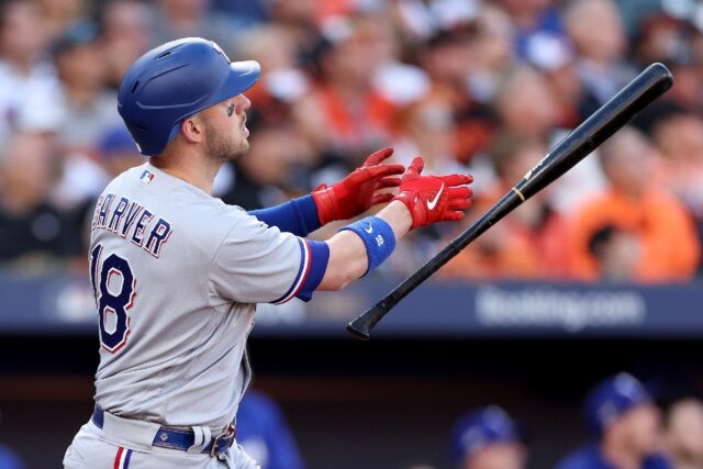 Grand slam: Mitch Garver watches as his home run sails over the wall in the Texas Rangers'