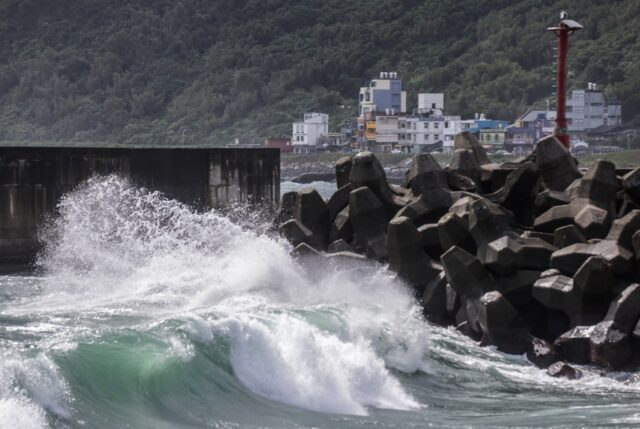 Heavy surf breaks on the shore of northern Taiwan as Typhoon Koinu grazes the island on Th