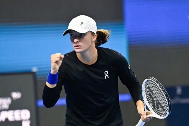 Iga Swiatek came from behind to defeat Marketa Vondrousova at the WTA Finals in Cancun on