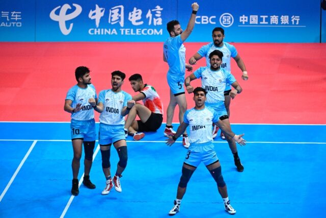 India's players react after a point in the men's kabaddi gold medal match