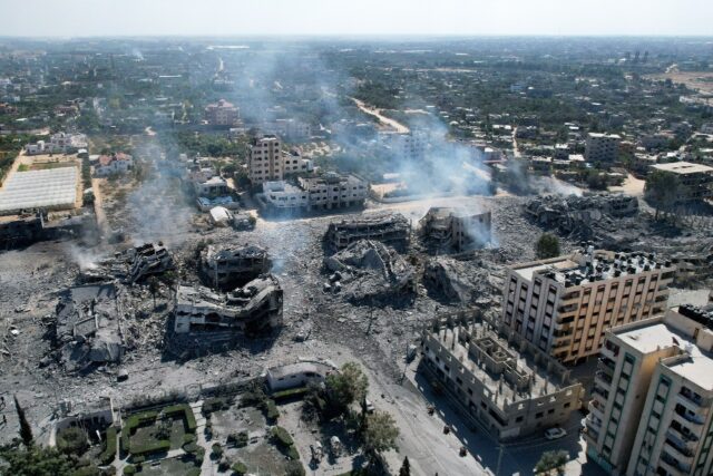 The Israeli bombardment in the central Gaza town of Al-Zahra razed more than 20 buildings,