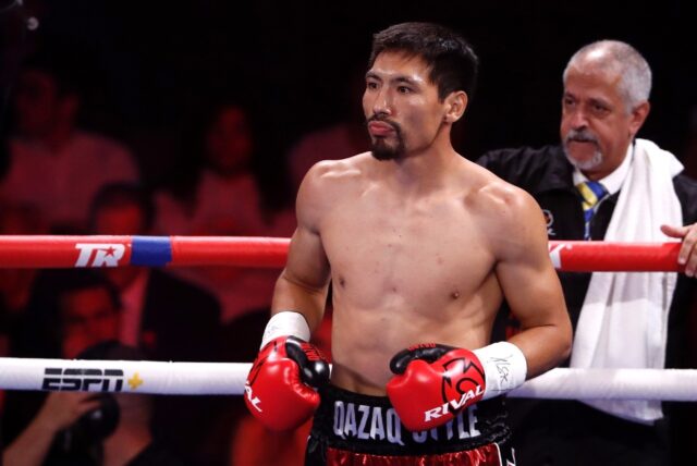 Janibek Alimkhanuly of Kazakhstan, shown at a 2021 bout, unified the WBO and IBF middlewei