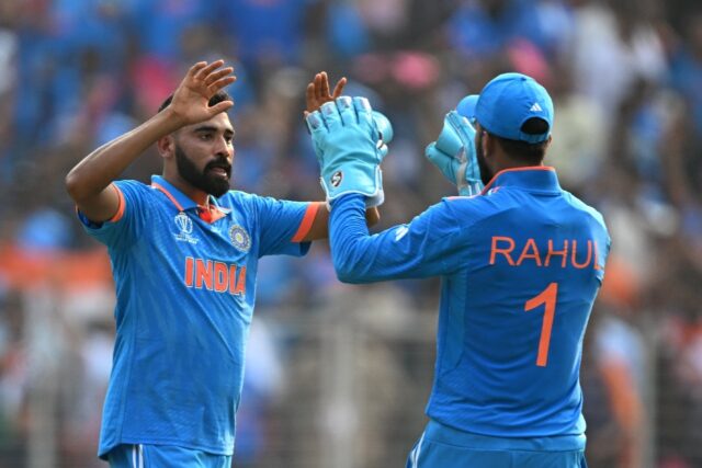 Key breakthrough: India's Mohammed Siraj (left) celebrates with teammate KL Rahul after ta