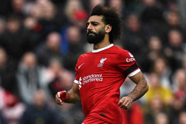 Mohamed Salah reacts after scoring his second goal for Liverpool in a Merseyside derby vic