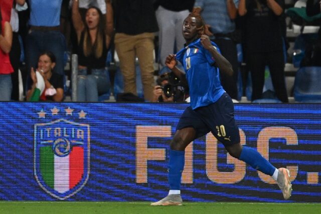 Moise Kean celebrates after scoring the first of his two goals in his last international s