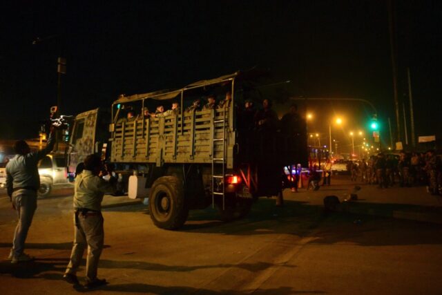Members of the army leave after an operation at Guayas 1 prison. Six suspects in the assas