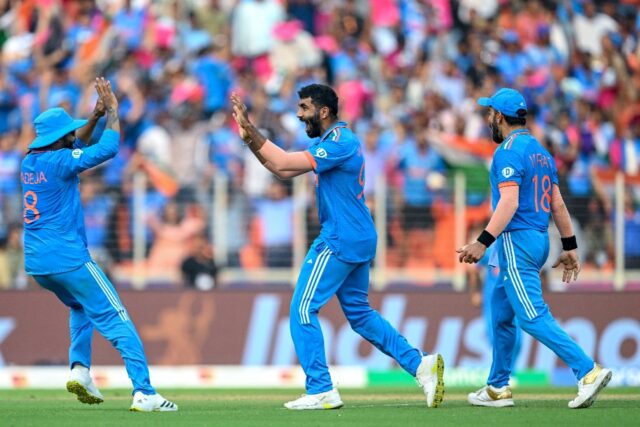 Man of the match: India's Jasprit Bumrah celebrates with teammates after taking the wicket