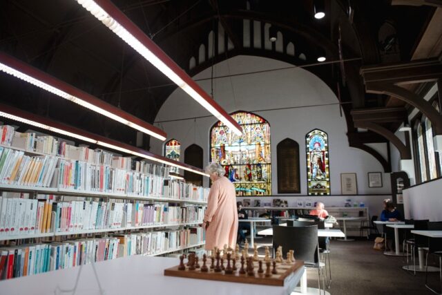 People visit the Mordecai-Richler Library built in a repurposed church in Montreal, Canada