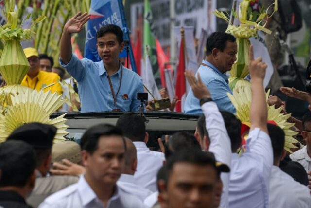 Presidential candidate Prabowo Subianto (R) and his running mate Gibran Rakabuming Raka (L