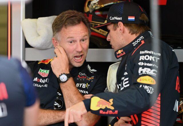 Red Bull Racing's Dutch driver Max Verstappen speaks with team principal Christian Horner