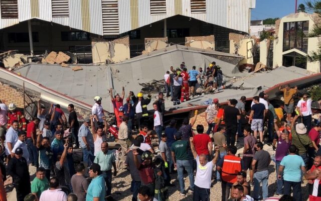 Rescuers said 80 people had been in attendance at the Santa Cruz parish when the roof cave