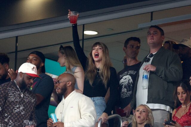 Singer Taylor Swift cheers prior to the NFL game between the Kansas City Chiefs and the Ne